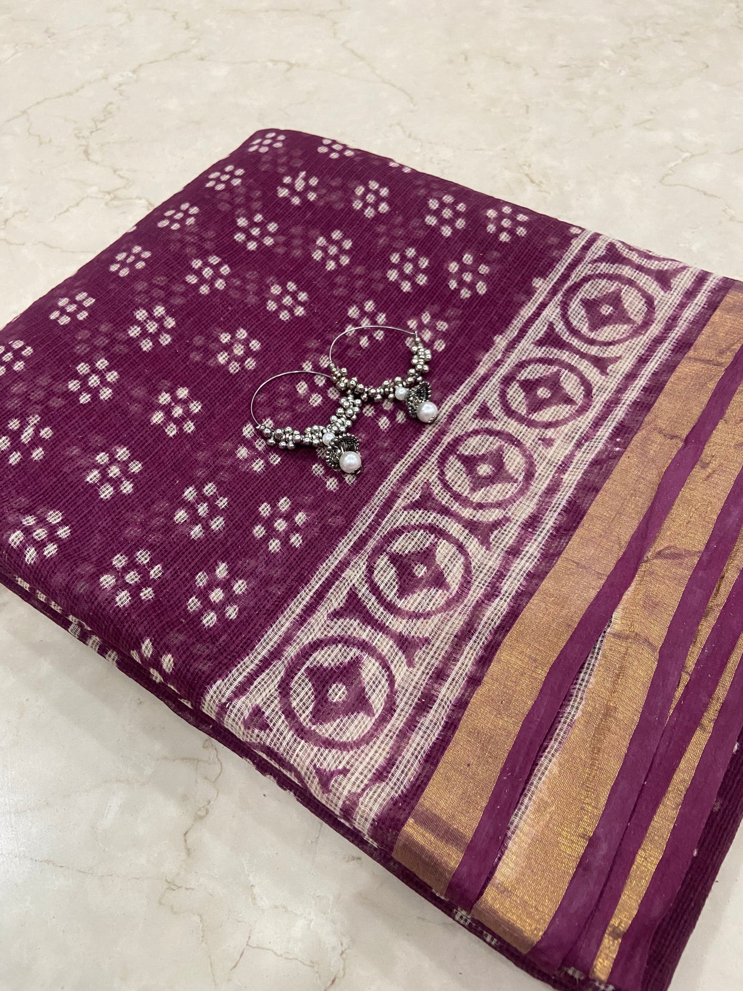 Wine floral butti cotton kota doria zari border saree
