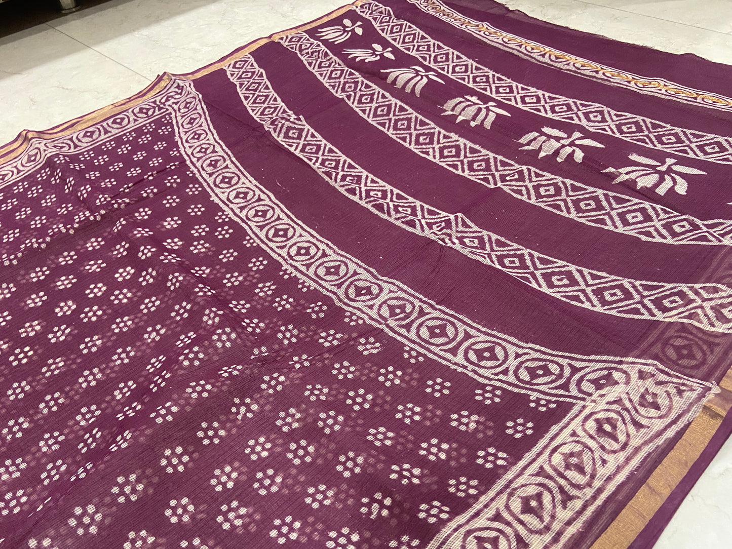 Wine floral butti cotton kota doria zari border saree