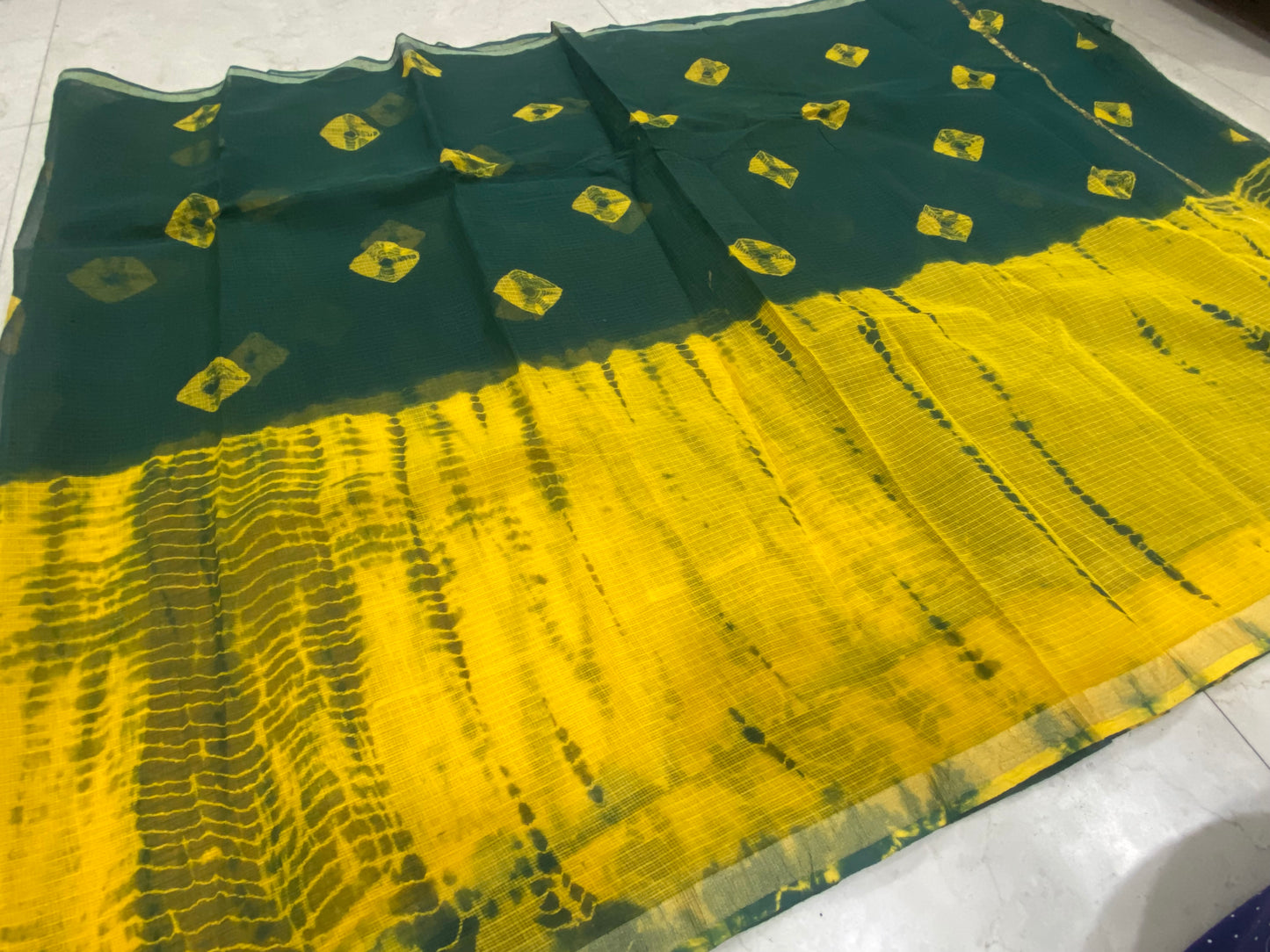 Bandhani printed green and yellow cotton kota doria zari border saree