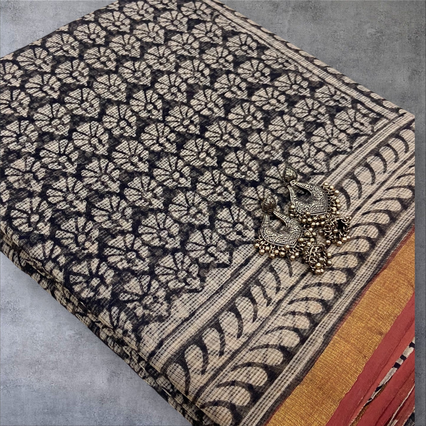 Black flower butti cotton kota doria saree