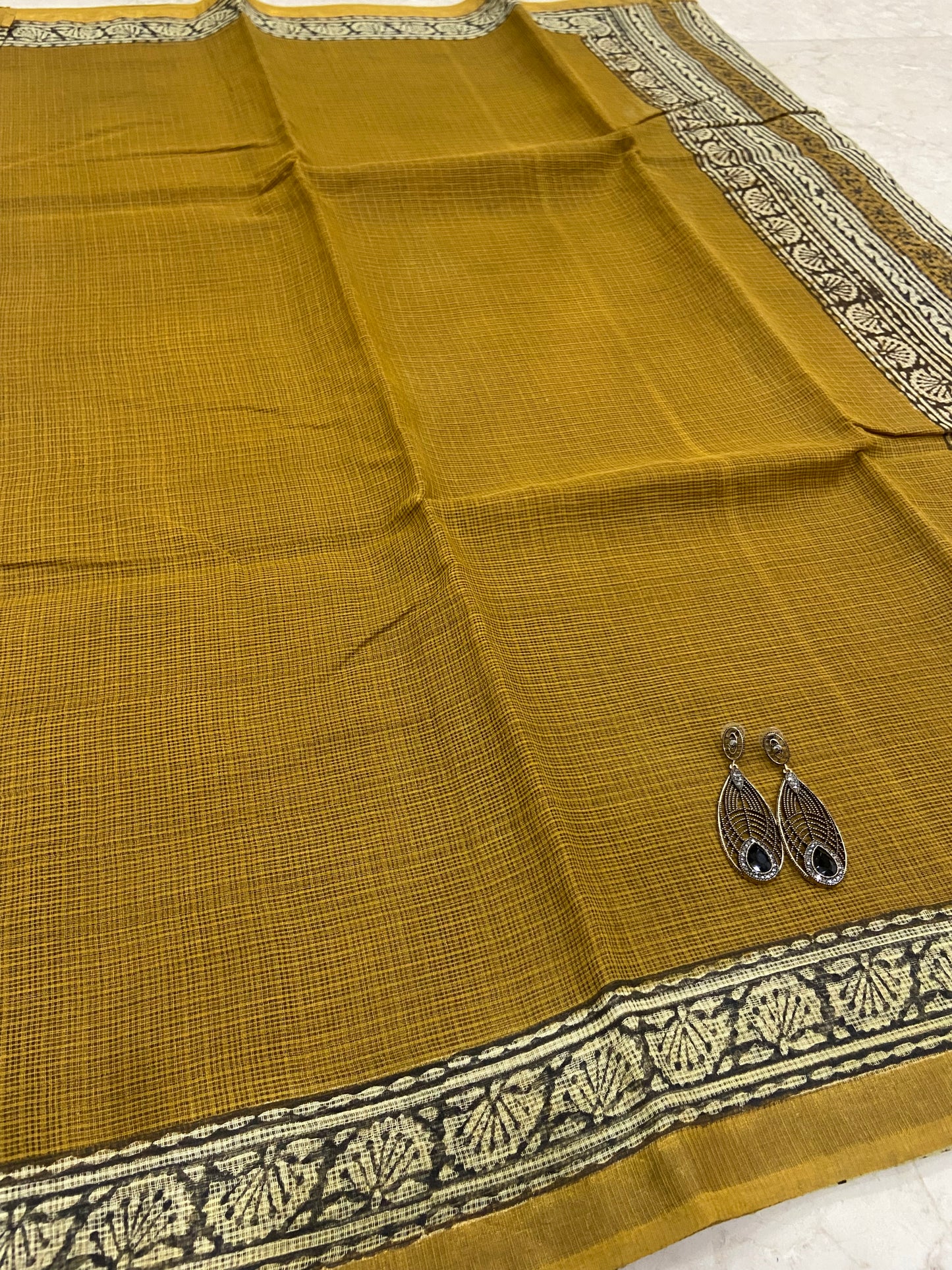 Mustard yellow cotton kota doria saree