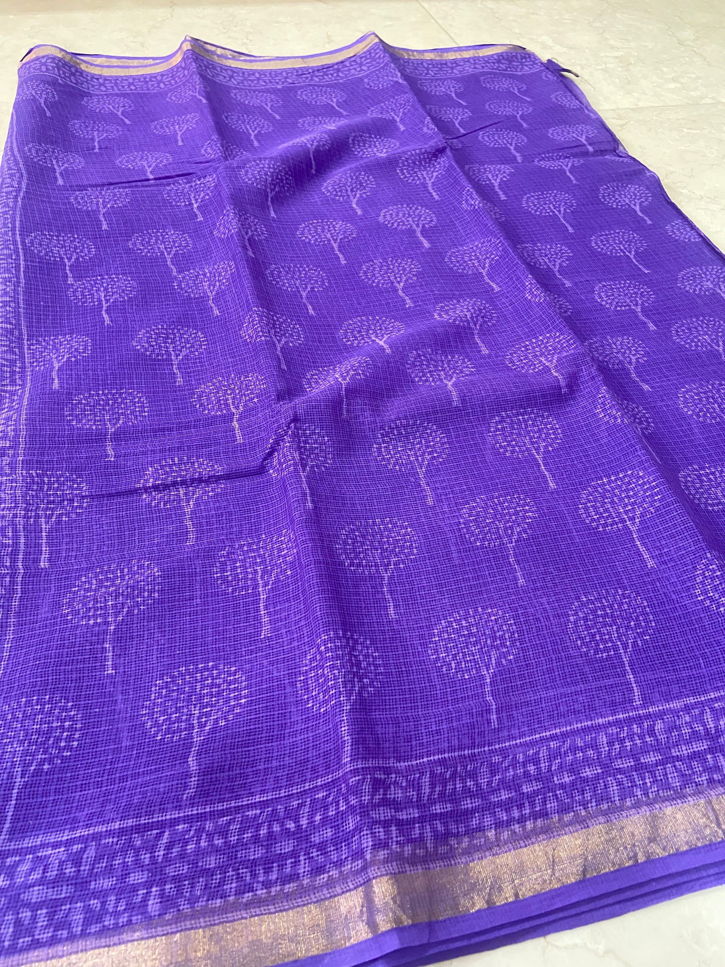Purple cotton kota doria zari border saree