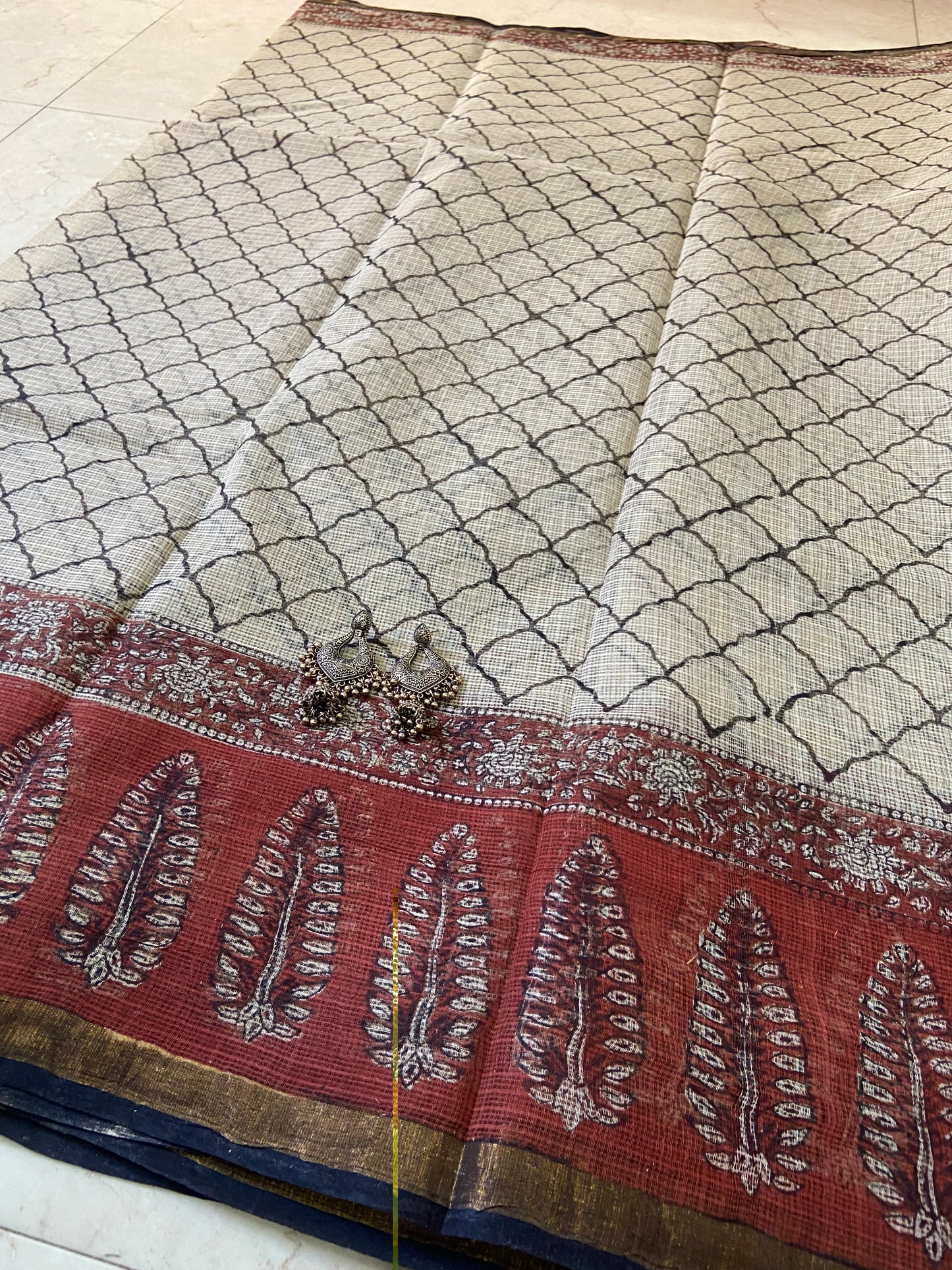 White and red leaf border cotton kota doria saree