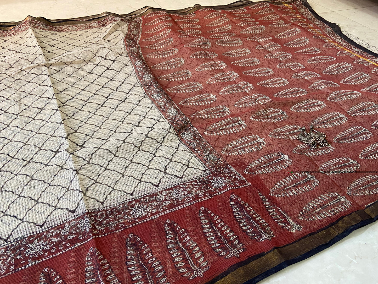 White and red leaf border cotton kota doria saree