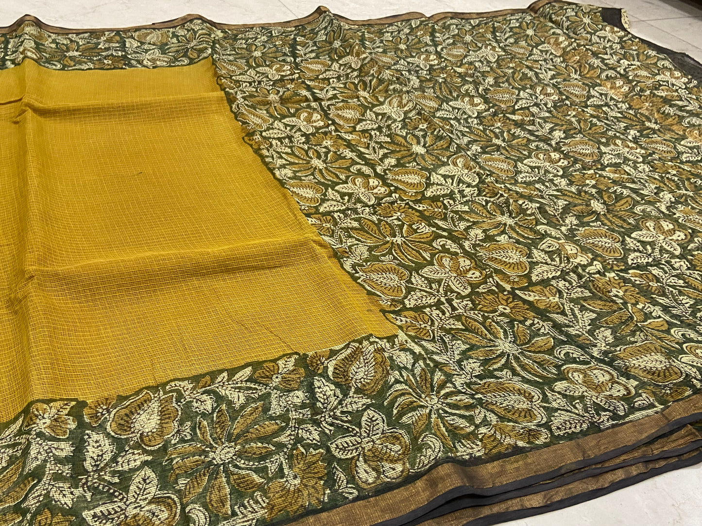 Flowers border yellow cotton kota doria saree