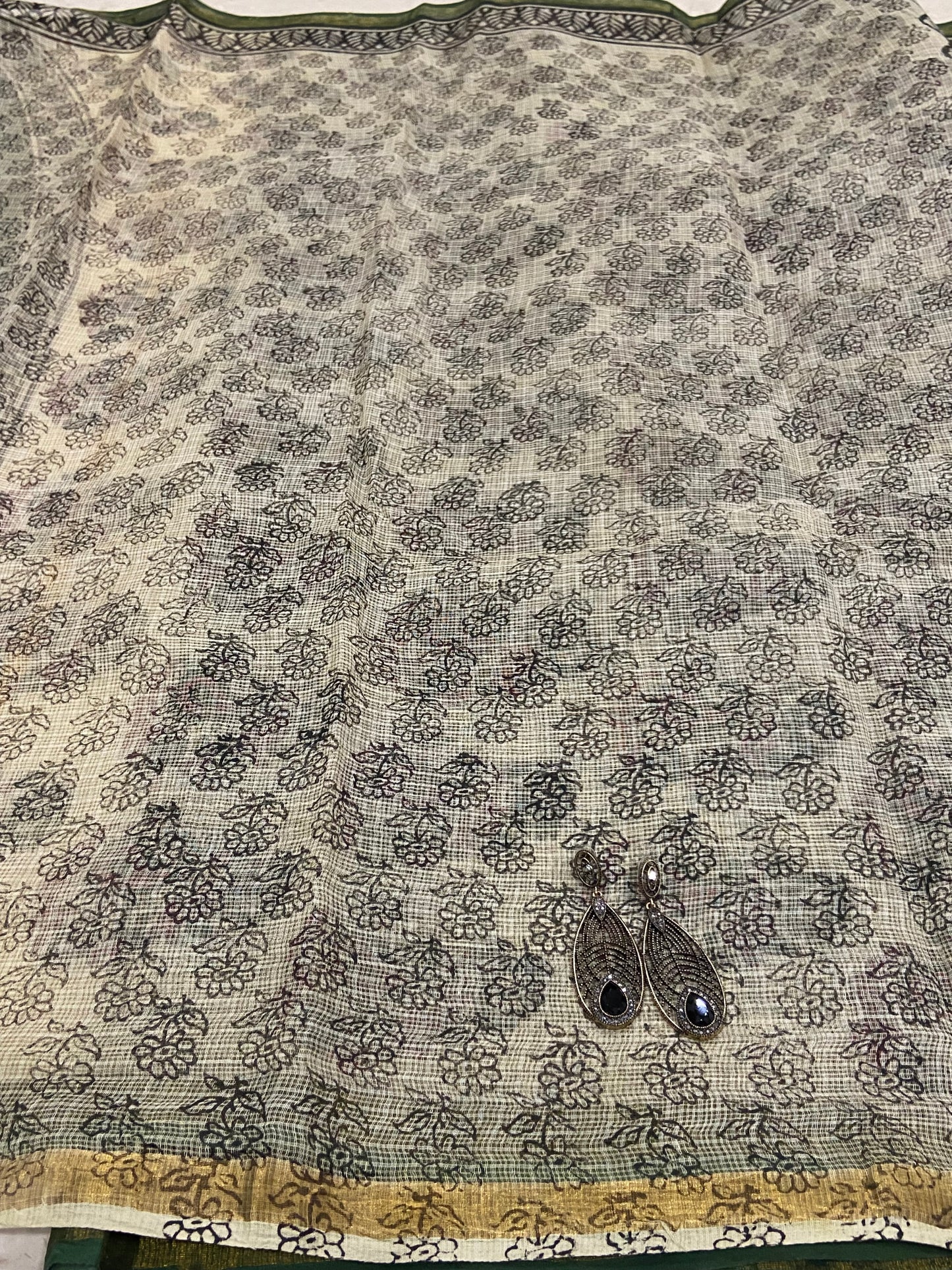 Green flower buttis cotton kota doria zari border saree