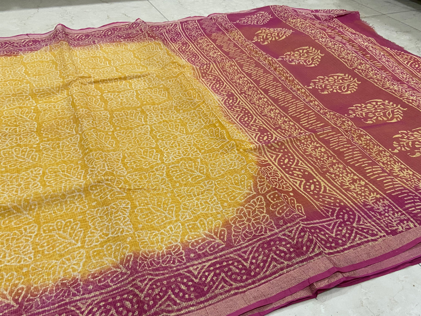 Yellow and pink handblock printed cotton kota doria saree