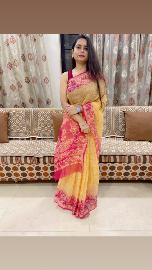 Yellow and pink handblock printed cotton kota doria saree
