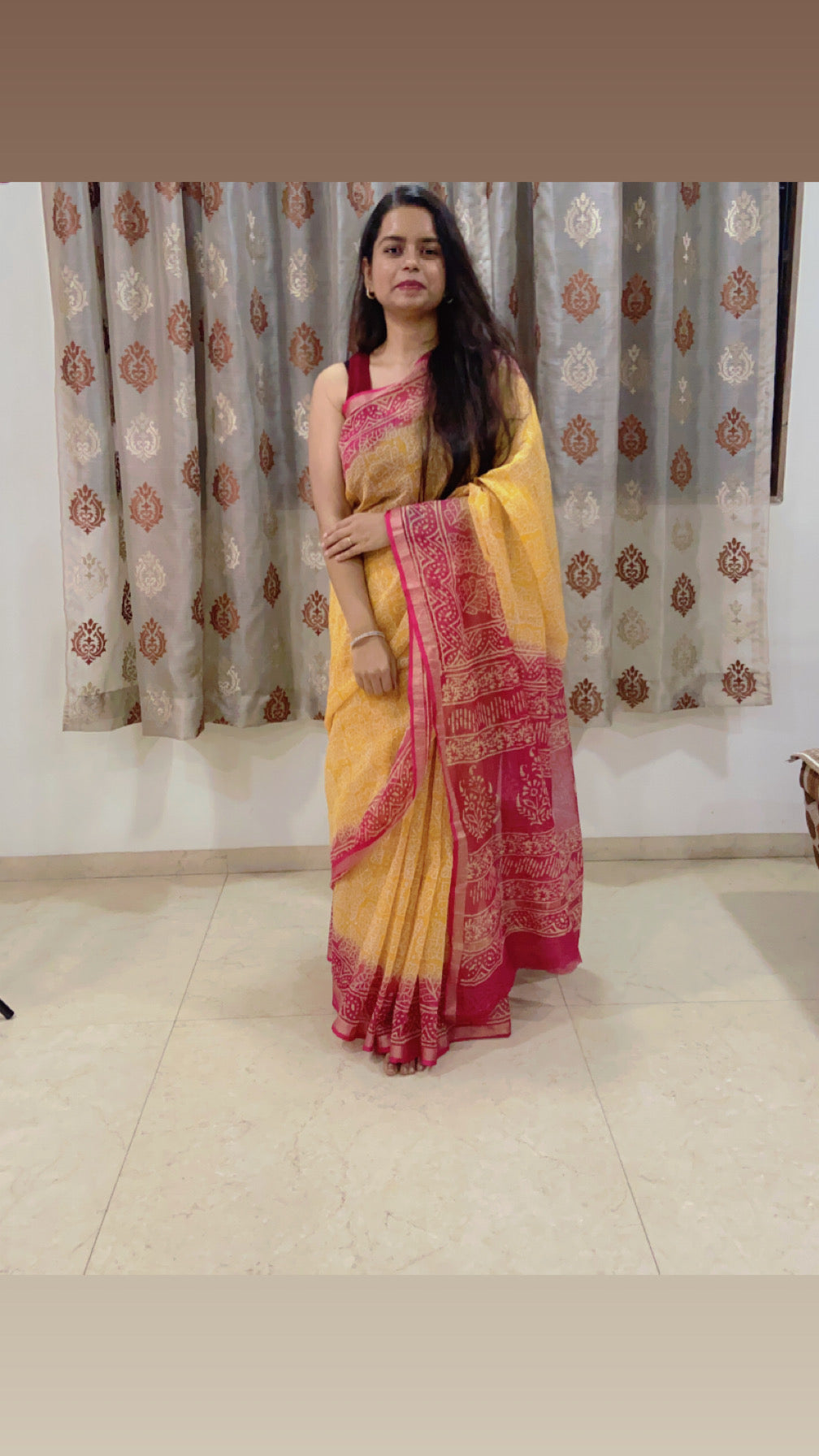 Yellow and pink handblock printed cotton kota doria saree