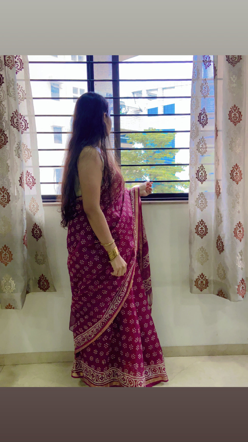 Wine floral butti cotton kota doria zari border saree