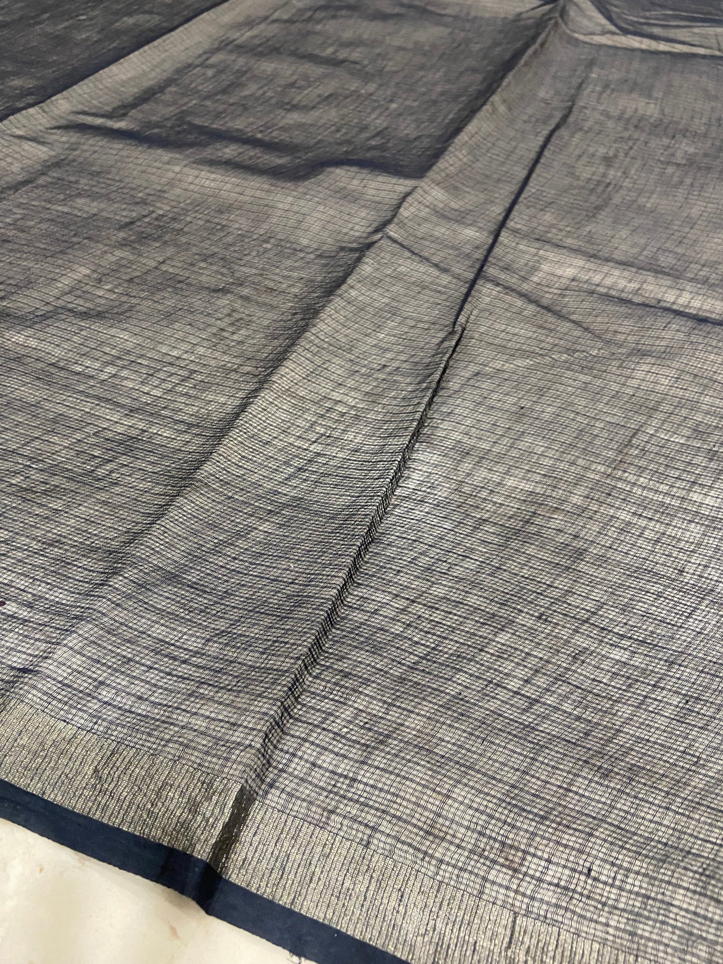 Black and white cotton kota doria with floral zari border saree