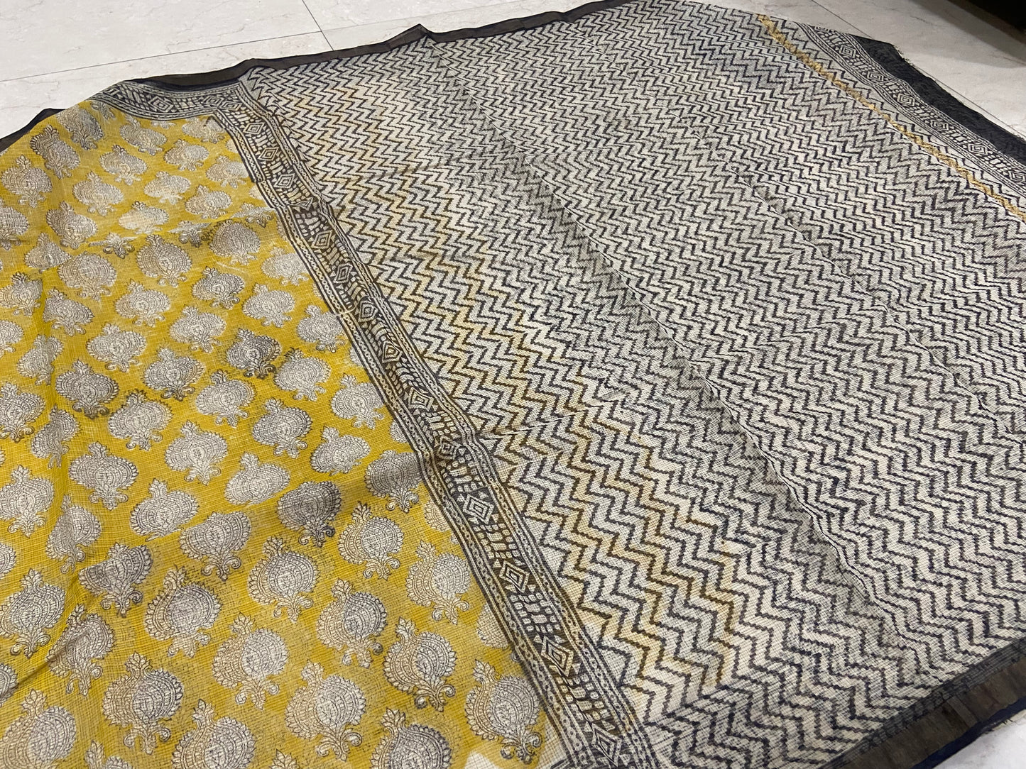 Yellow cotton kota doria zari border saree