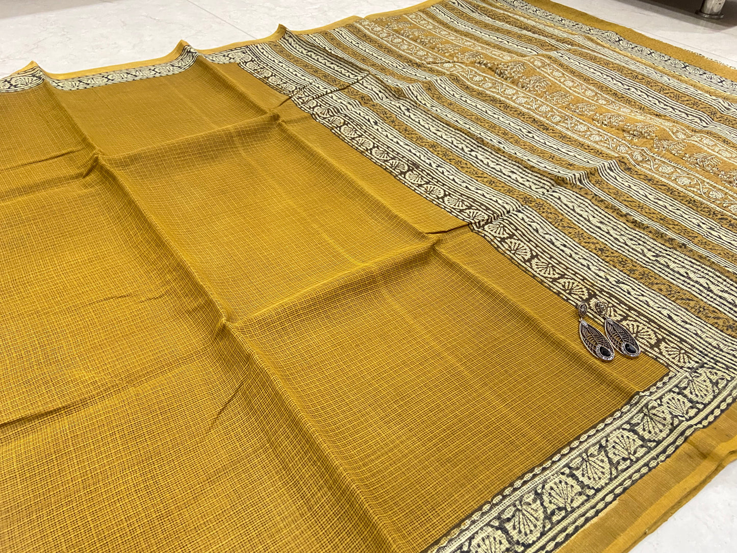 Mustard yellow cotton kota doria saree