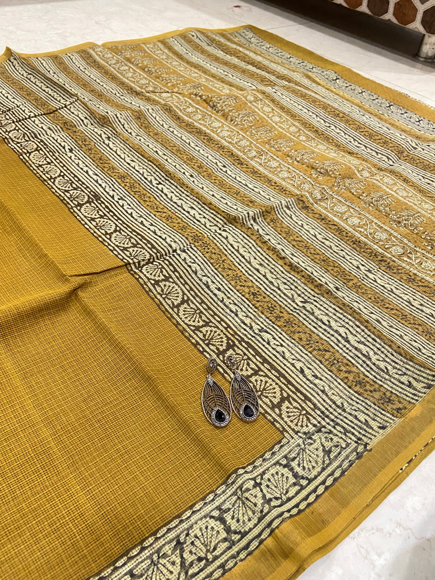 Mustard yellow cotton kota doria saree