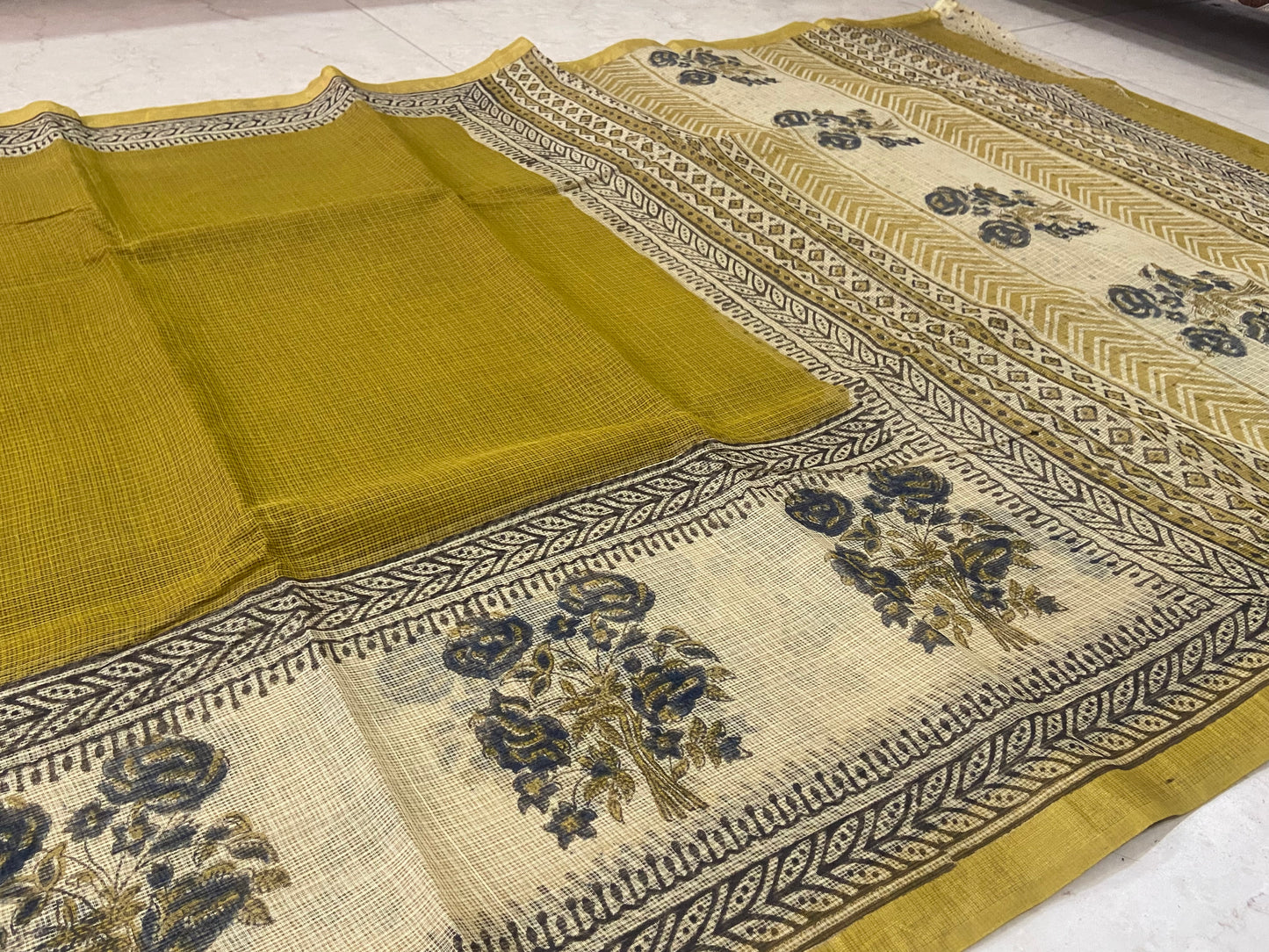 Yellow cotton kota doria zari border saree