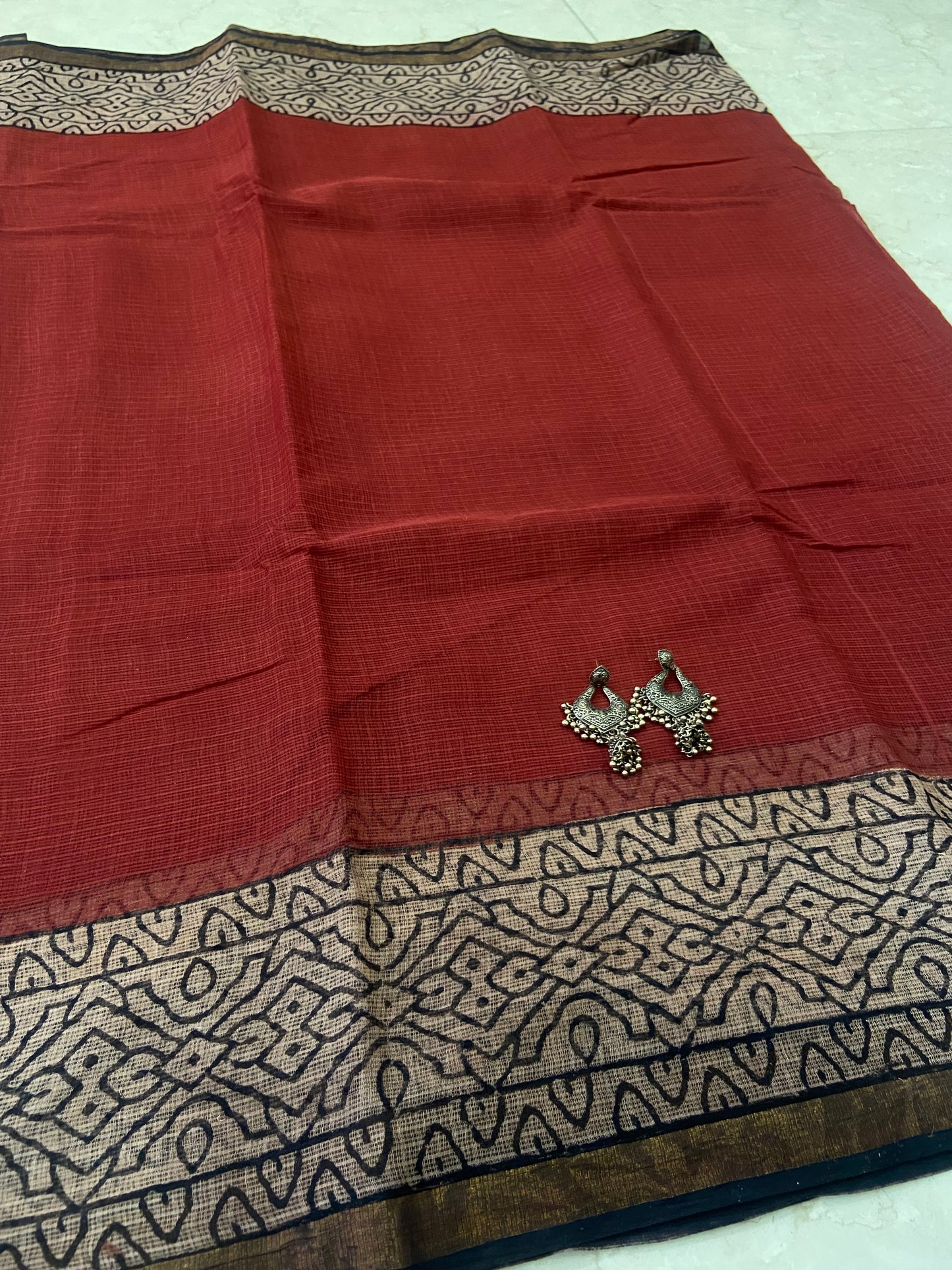 Maroon red cotton kota doria zari border saree