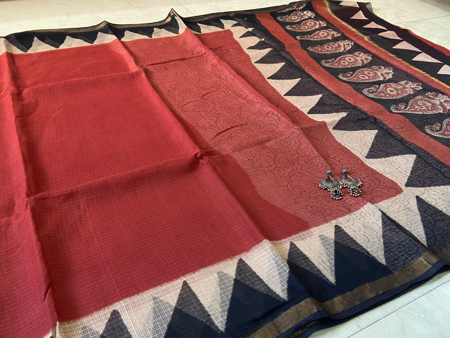 Brick red cotton kota doria zari border saree