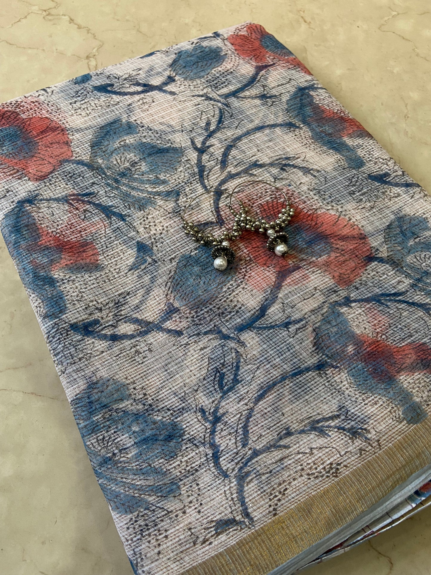 Blue and red flower buttis cotton kota doria zari border saree