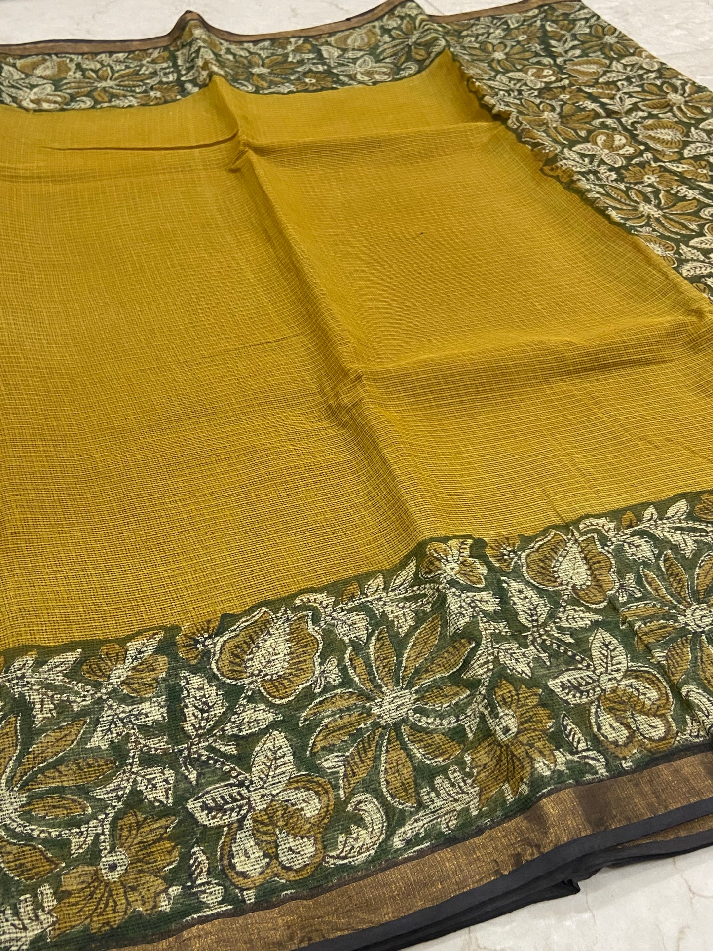 Flowers border yellow cotton kota doria saree