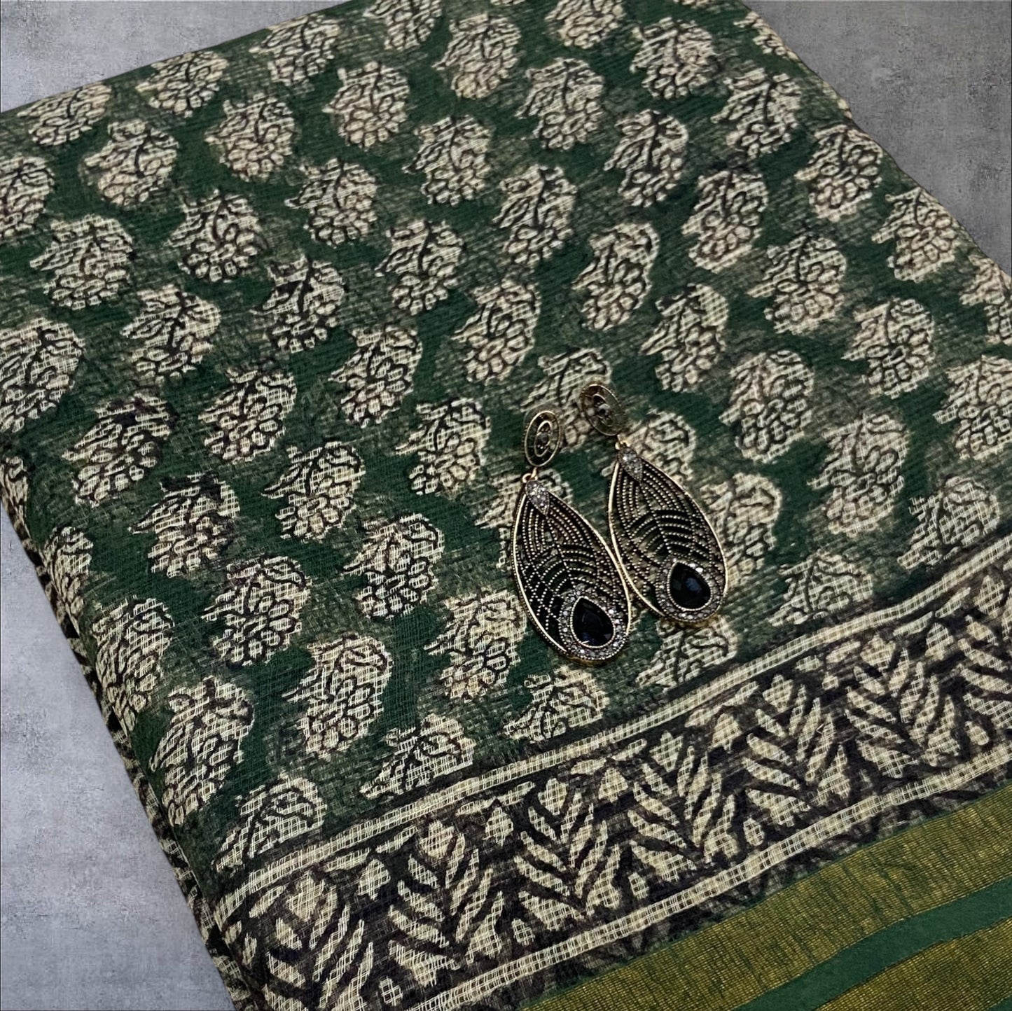 Green flower buttis cotton kota doria zari border saree