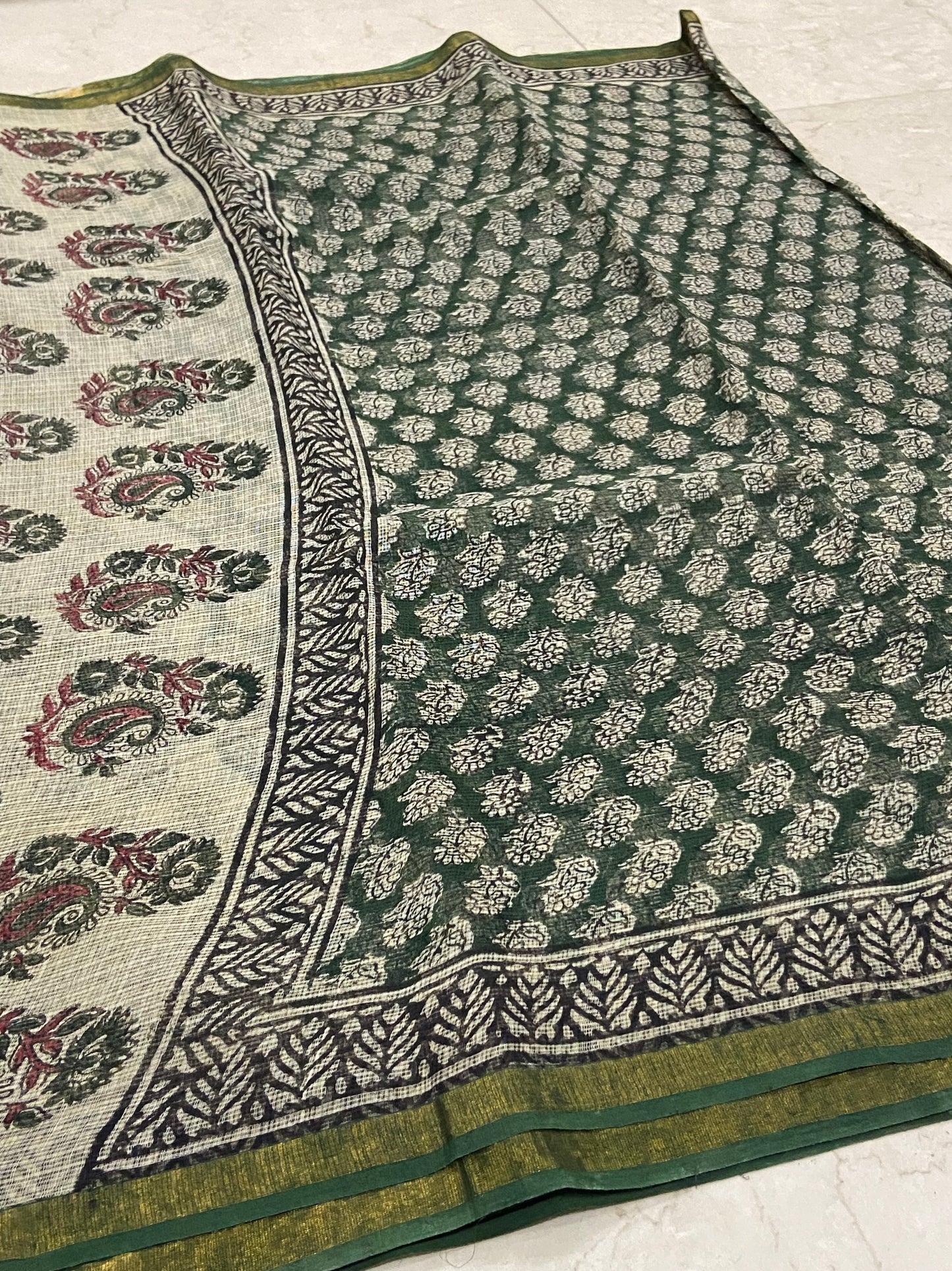 Green flower buttis cotton kota doria zari border saree