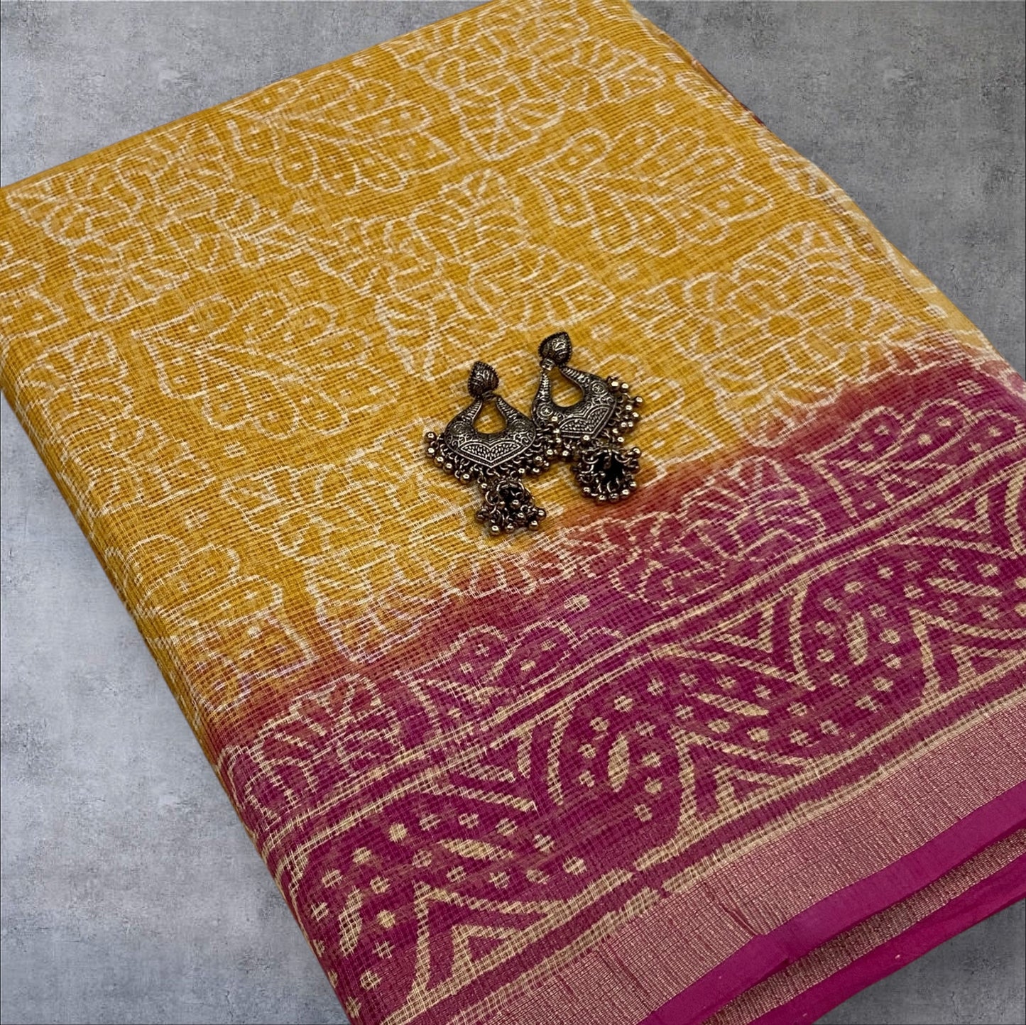 Yellow and pink handblock printed cotton kota doria saree